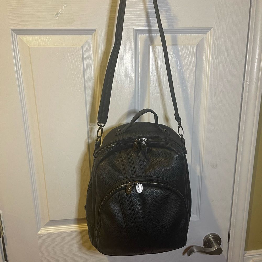 Damsel in Defense Black Synthetic Leather shoulder bag padded interior pocket.